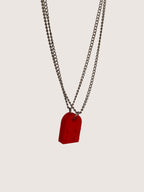 Magillas collar para pareja con colgante de pieza de Lego roja y cadena de acero inoxidable.