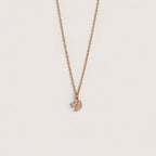 Collar Magillas de acero inoxidable con dije de luna y estrella adornado con circonitas cúbicas.