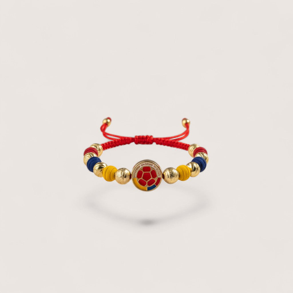 Magilla's Colombian football fan bracelet with red, yellow, and blue beads and a soccer ball charm.