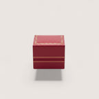 Magillas Estuche amor, tres cajas de joyería rojas con borde dorado y textura de cuero.