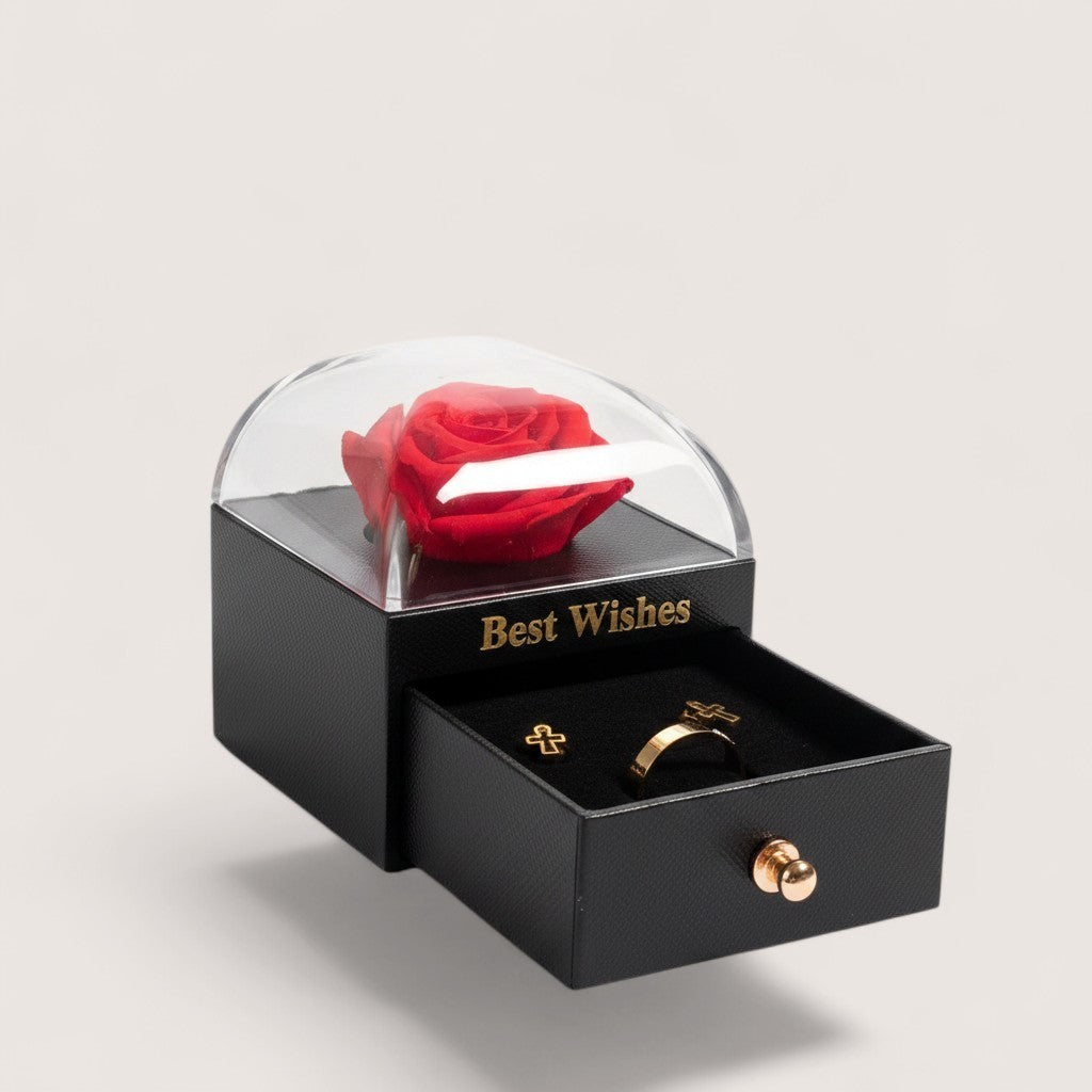 Magillas preserved red rose jewelry gift box with a black matte base, clear dome, and pull-out drawer for jewelry.