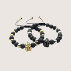 Magillas pulsera gladiador de acero inoxidable, neopreno y rodio con cuentas de lava y cascos dorados y plateados.